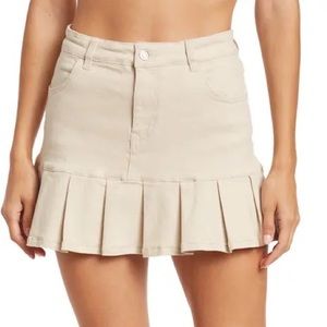 ELODIE: Twill Ruffle Mini Skirt in color “Stone” a light cream color type